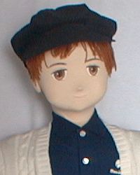 Boy doll in cap