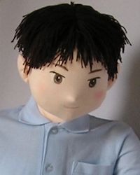 Small-eyed boy doll
